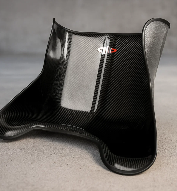 Carbon fiber go kart seat from hand layup with background